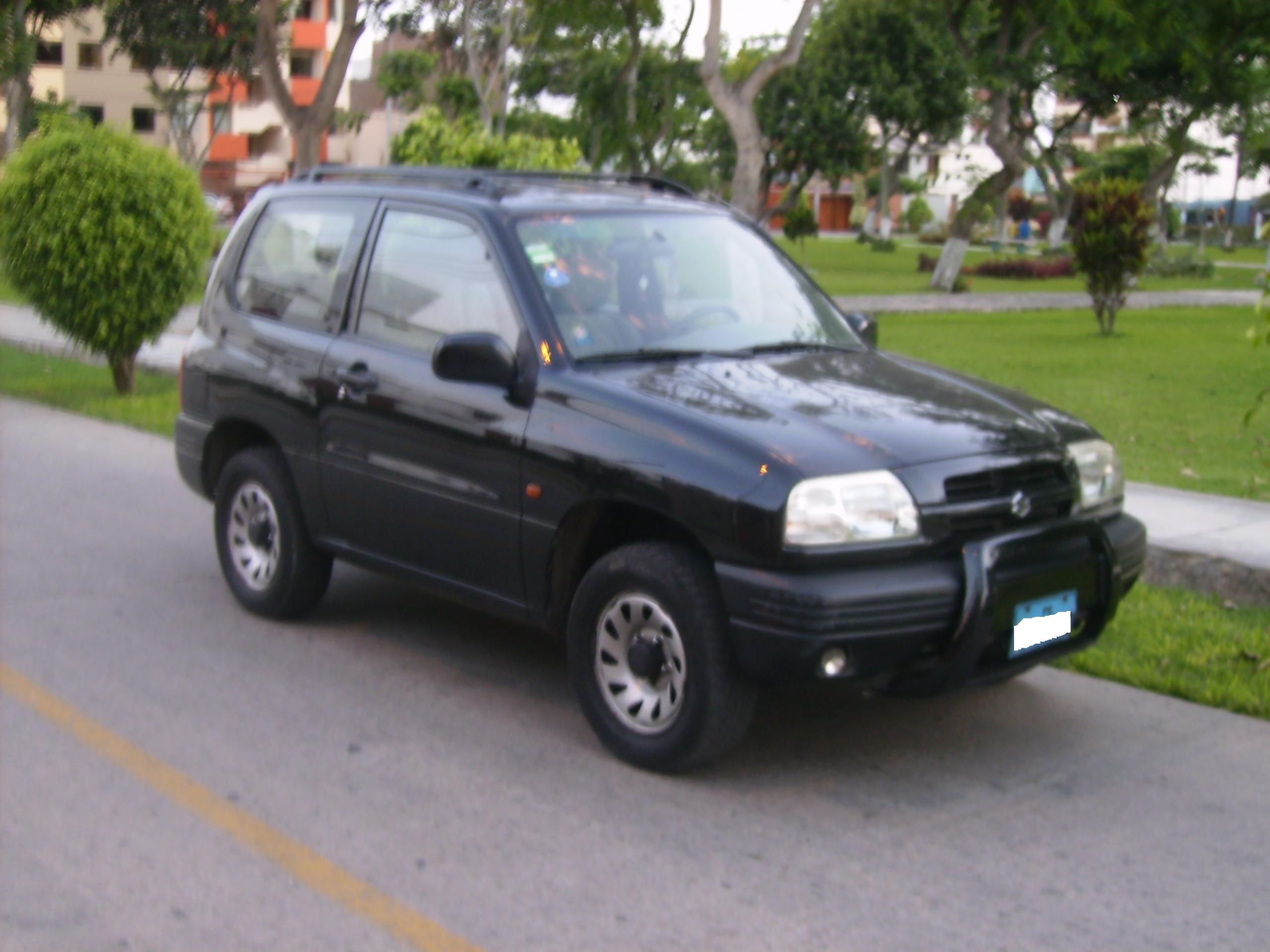 1999 Suzuki Grand Vitara JLX 060 Times, Top Speed, Specs, Quarter Mile
